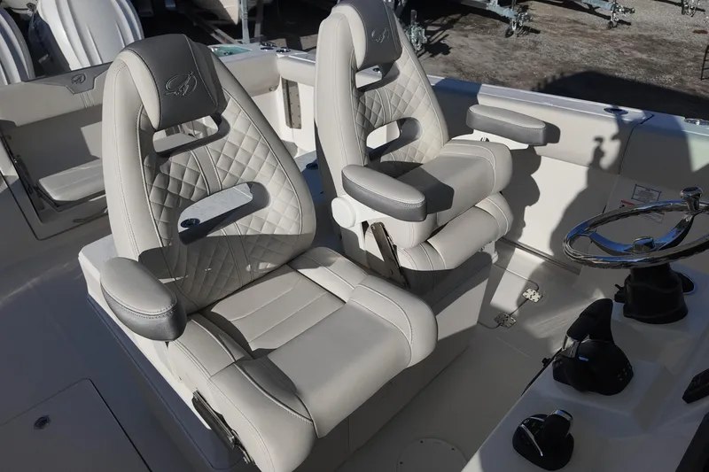Slide: The Image of Luxurious seating on 2026 Sailfish 312 CC boat, featuring plush, ergonomic design. - 19