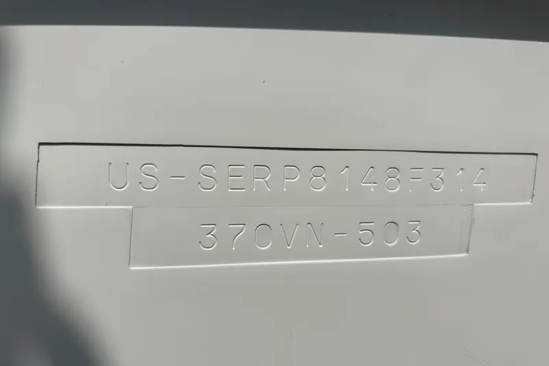 Slide: The Image of 2014 Sea Ray 370 Venture hull identification number, US-SERP8148F314, embossed on the boat. - 54