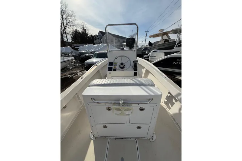 Slide: The Image of 2018 NorthCoast 190 Center Console boat interior with steering wheel and seating. - 5
