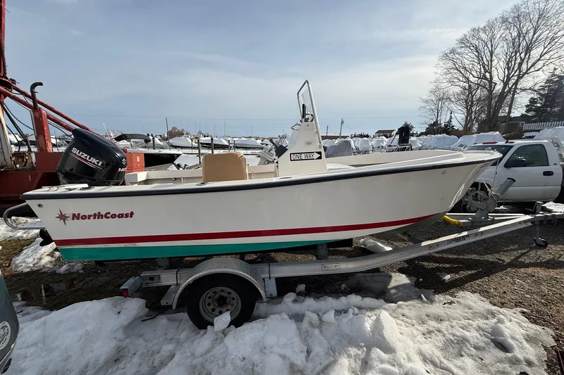 Slide: The Image of 2018 NorthCoast 190 Center Console boat on trailer, snowy outdoor setting. - 8