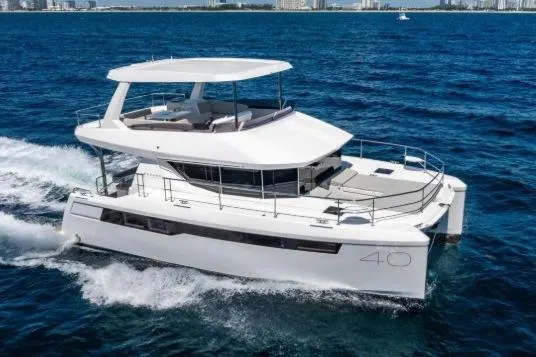 The Image of 2024 Leopard 40 Powercat cruising on open water, showcasing sleek design and modern features. - 0