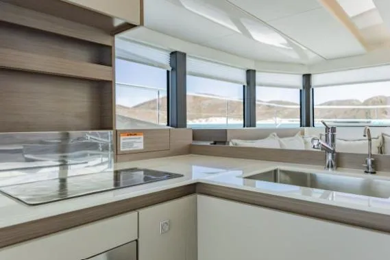 Slide: The Image of Modern kitchen interior of 2024 Leopard 40 Powercat yacht with sleek design and panoramic windows. - 15