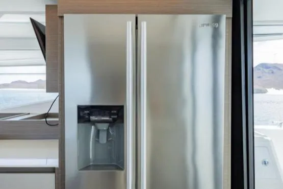Slide: The Image of Stainless steel refrigerator in 2024 Leopard 40 Powercat yacht interior. - 17