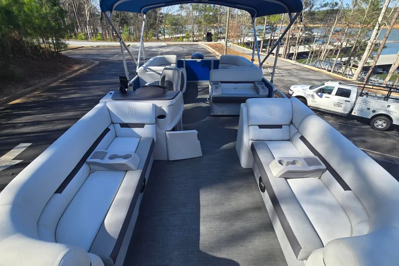 Slide: The Image of 2022 Godfrey Sweetwater 2286 SB pontoon boat with spacious seating and canopy. - 7