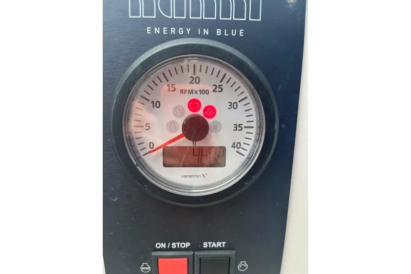 Slide: The Image of Tachometer on 1979 Downeaster 38 boat, displaying RPM and warning lights. - 16