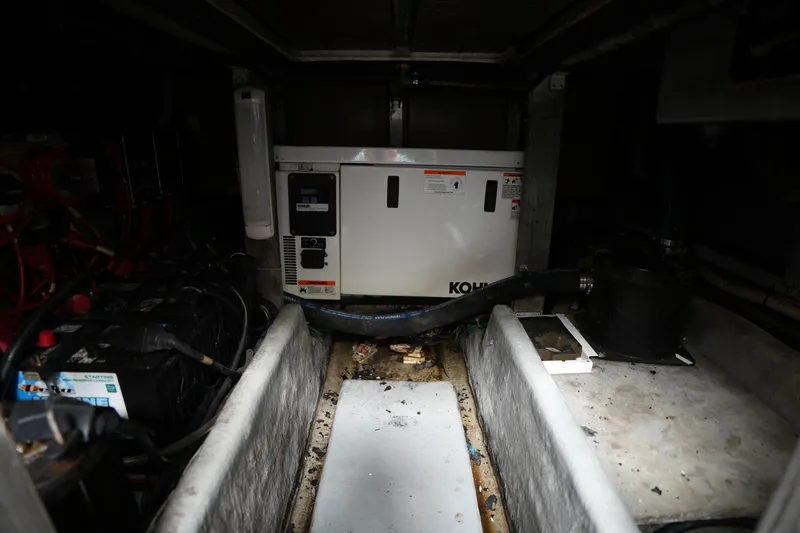 Slide: The Image of Engine room of 1993 Sea Ray 400 Express Cruiser with Kohler generator. - 27