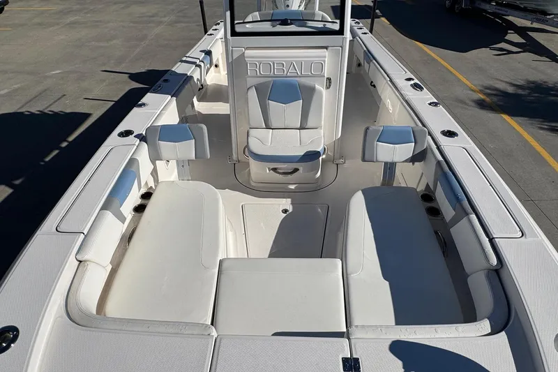 Slide: The Image of 2023 Robalo 266 Cayman boat interior with spacious seating and modern design. - 26