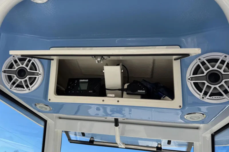 Slide: The Image of 2023 Robalo 266 Cayman boat console with Simrad electronics and JL Audio speakers. - 9