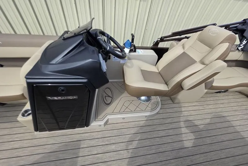 Slide: The Image of 2026 Veranda VR22RC Tri-Toon boat on trailer, parked outdoors under a blue sky. - 12