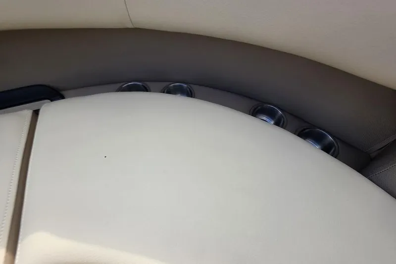 Slide: The Image of Close-up of 2026 Veranda VR22RC Tri-Toon dashboard gauges showing RPM and trim indicators. - 13