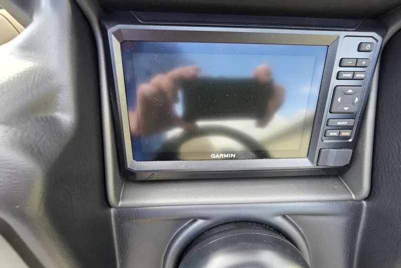 Slide: The Image of Open storage compartment in Veranda VR22RC Tri-Toon boat seat, 2026 model. - 19