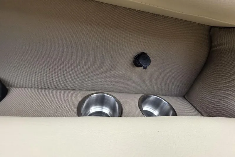 Slide: The Image of 2026 Veranda VR22RC Tri-Toon boat ladder against a cloudy sky backdrop. - 26