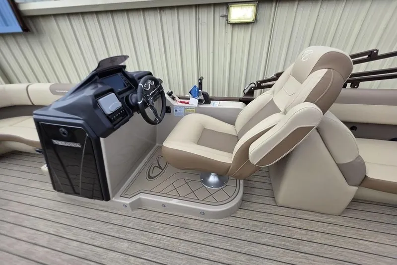 Slide: The Image of 2026 Veranda VR22RC Tri-Toon boat deck with seating and ladder, viewed from above. - 29