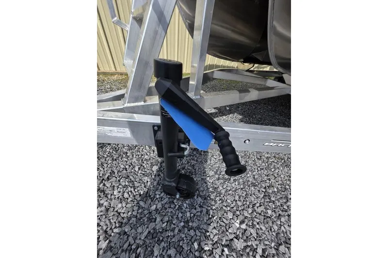 Slide: The Image of 2026 Veranda VR22RC Tri-Toon interior with beige seating and modern console design. - 33