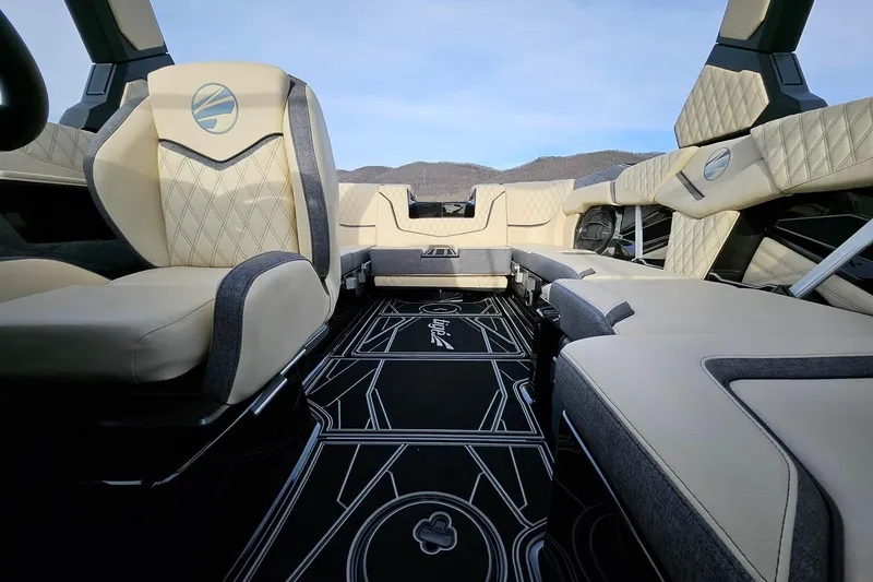 Slide: The Image of Luxurious interior of 2026 Tigé 24RZX boat with elegant seating and modern design. - 15