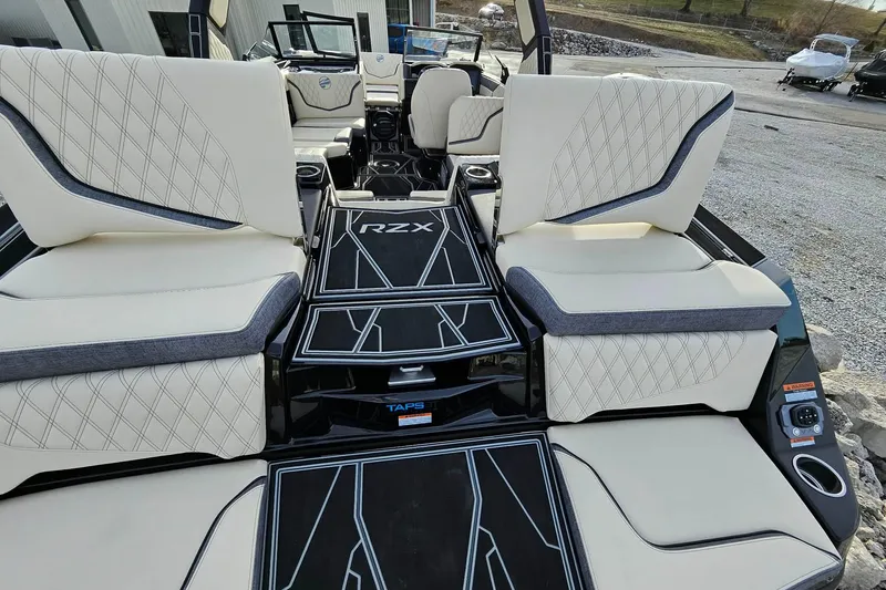 Slide: The Image of 2026 Tigé 24RZX boat interior with luxurious seating and modern design. - 20