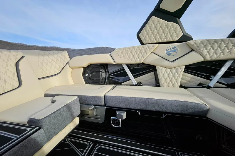 Slide: The Image of Luxurious interior of 2026 Tigé 24RZX boat with elegant seating and modern design. - 21