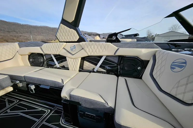 Slide: The Image of Luxurious interior of 2026 Tigé 24RZX boat with plush seating and modern design. - 23