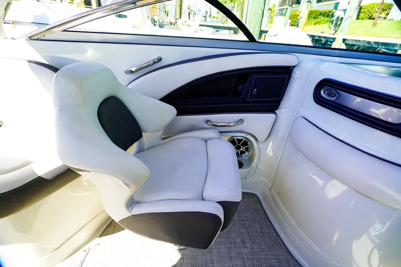 Slide: The Image of 2023 Crownline 270 XSS boat interior with luxurious seating and modern design. - 12