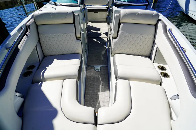 Slide: The Image of 2023 Crownline 270 XSS boat interior with luxurious seating and elegant design. - 20