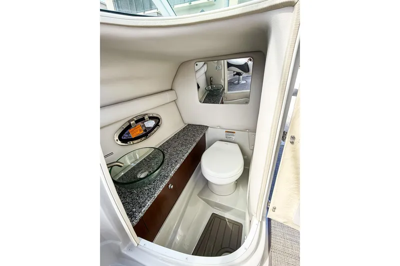 Slide: The Image of Overhead view of 2023 Crownline 270 XSS boat on water. - 4