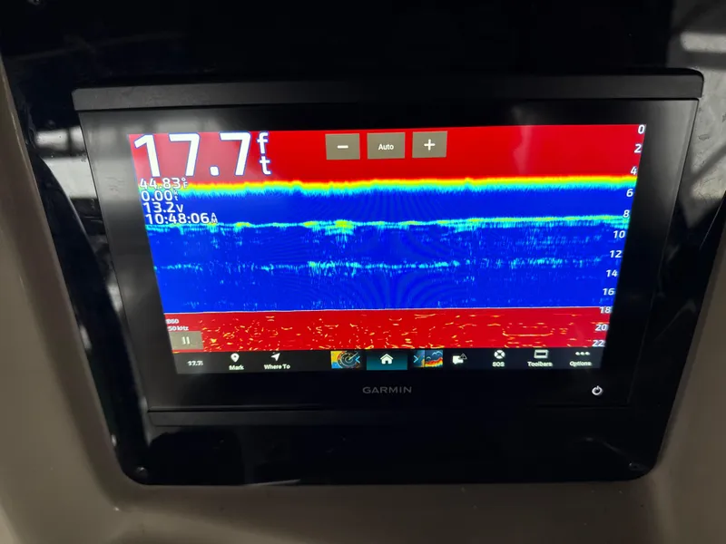 Slide: The Image of Garmin marine display on 2005 Sea Ray 320 Sundancer showing depth and sonar data. - 11