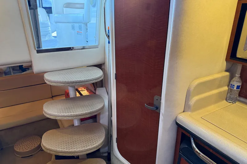 Slide: The Image of Interior of 2005 Sea Ray Sundancer 320 with steps, door, and countertop. - 34