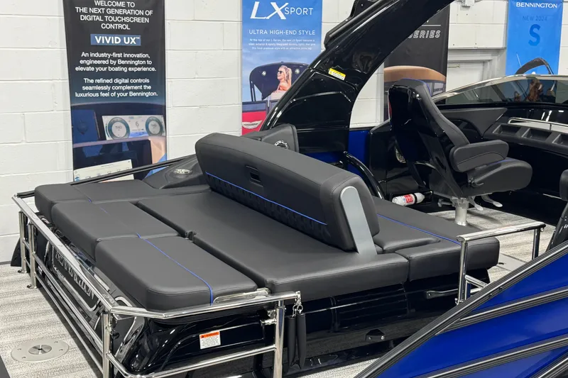 Slide: The Image of 2026 Bennington 25 QSBWASE boat interior with luxurious seating and advanced digital controls. - 12