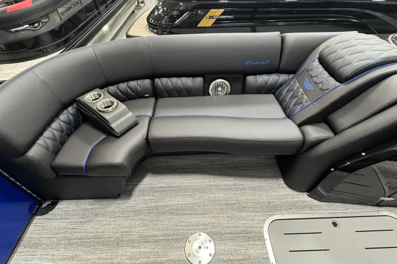 Slide: The Image of Luxurious seating on 2026 Bennington 25 QSBWASE boat with cup holders and elegant design. - 14
