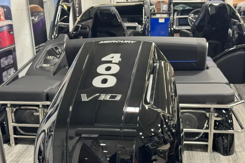 Slide: The Image of 2026 Bennington 25 QSBWASE boat with Mercury 400 V10 engine, sleek interior design. - 19