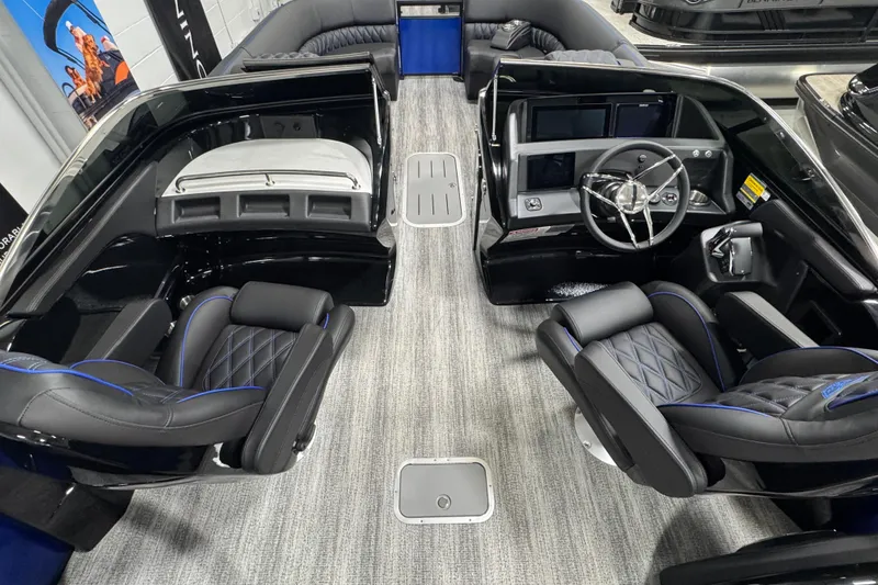 Slide: The Image of 2026 Bennington 25 QSBWASE boat interior with luxurious seating and modern dashboard. - 5