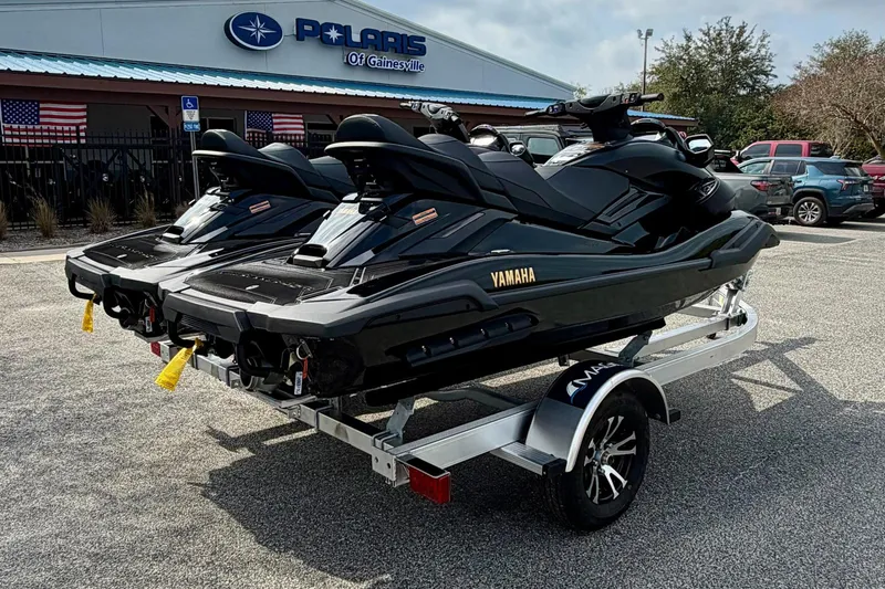 Slide: The Image of 2026 Yamaha WaveRunner FX Limited SVHO jet skis on a trailer at Polaris dealership. - 6