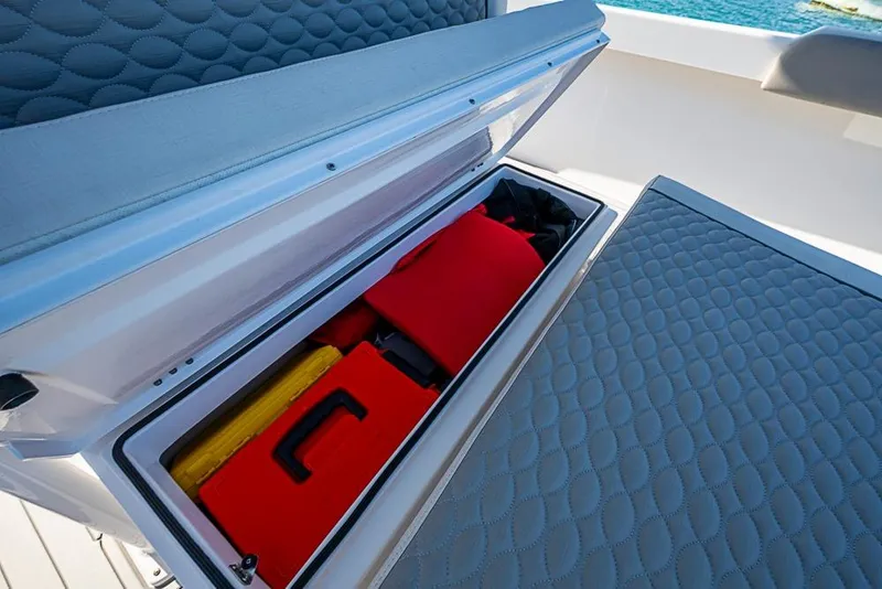 Slide: The Image of Storage compartment on 2021 Albury Brothers 33 boat with safety gear and equipment. - 11