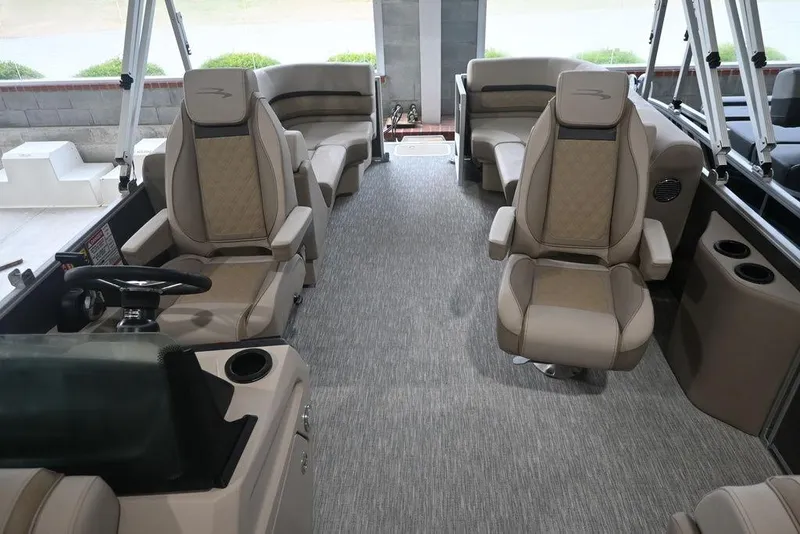 Slide: The Image of 2026 Bennington S Quad Bench 22 SSR interior with luxurious seating and modern design. - 12