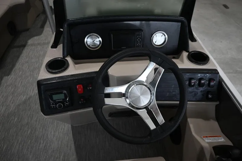 Slide: The Image of Steering console of 2026 Bennington S Quad Bench 22 SSR pontoon boat. - 13