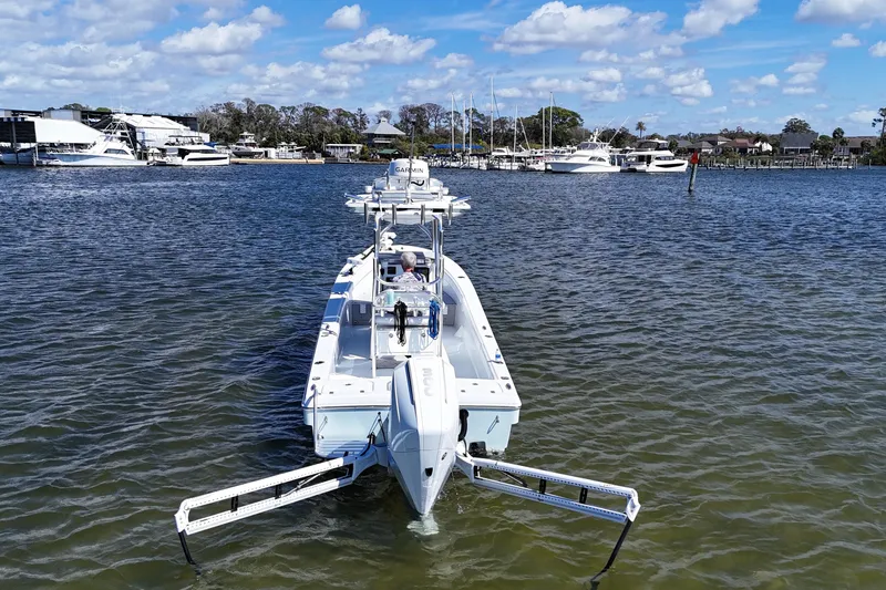 Slide: The Image of Andros Tarpon 26 boat 2023 in harbor, sunny day. - 3