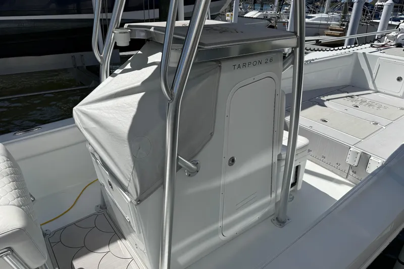 Slide: The Image of 2023 Andros Tarpon 26 boat interior with console and seating area. - 41