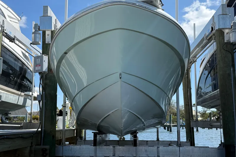 Slide: The Image of 2023 Andros Tarpon 26 boat on a dock. - 9