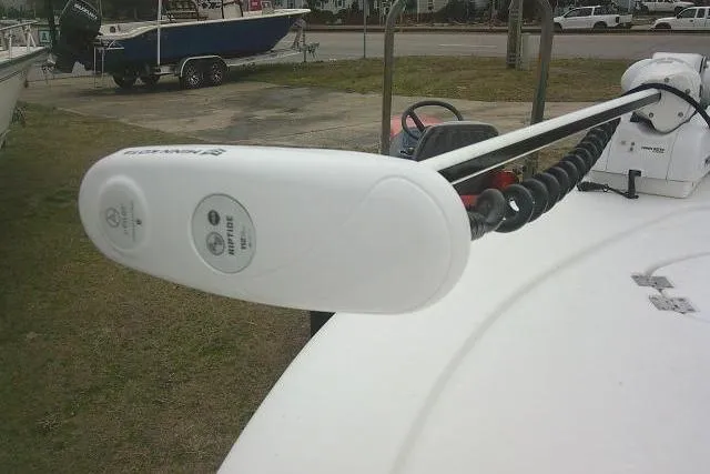 Slide: The Image of 2021 Tidewater 2110 Bay Max boat with trolling motor on deck. - 12
