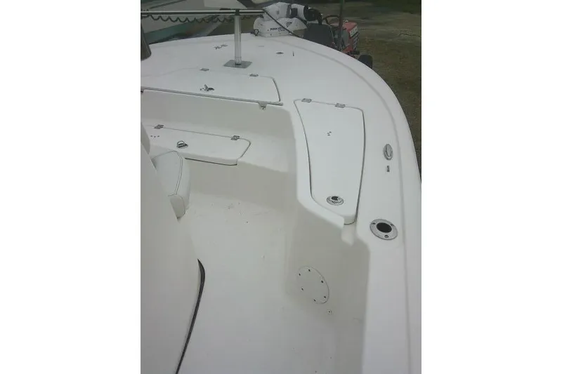 Slide: The Image of 2021 Tidewater 2110 Bay Max boat deck with storage compartments. - 21