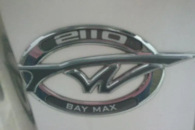 Slide: The Image of 2021 Tidewater 2110 Bay Max logo emblem on boat exterior. - 22