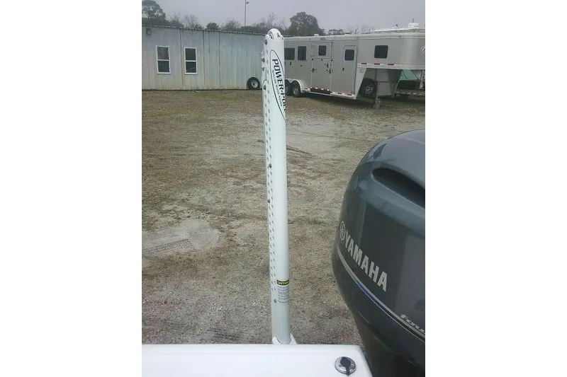 Slide: The Image of 2021 Tidewater 2110 Bay Max with Yamaha engine and Power-Pole in a parking area. - 26