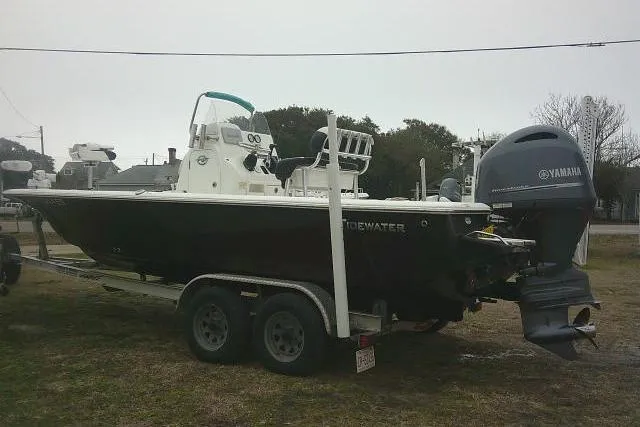 Slide: The Image of 2021 Tidewater 2110 Bay Max boat on trailer with Yamaha outboard motor. - 3