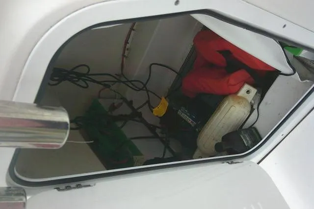 Slide: The Image of Storage compartment of 2021 Tidewater 2110 Bay Max boat with life jacket and equipment. - 30