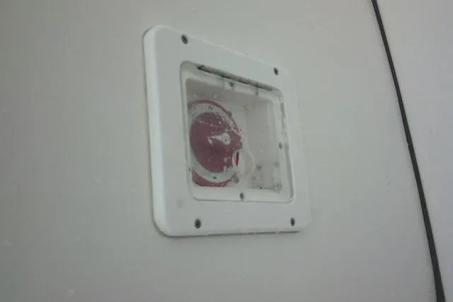 Slide: The Image of 2021 Tidewater 2110 Bay Max boat detail, featuring a white panel with a circular gauge. - 33