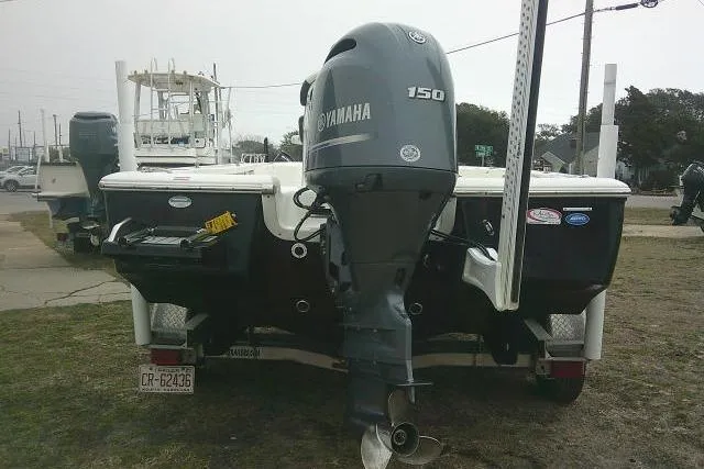 Slide: The Image of 2021 Tidewater 2110 Bay Max boat with Yamaha 150 outboard motor, rear view. - 4