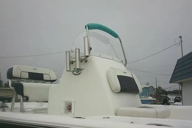 Slide: The Image of 2021 Tidewater 2110 Bay Max boat console with seating and rod holders. - 7
