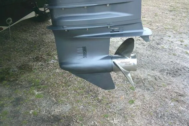 Slide: The Image of 2021 Tidewater 2110 Bay Max boat propeller on grass surface. - 9