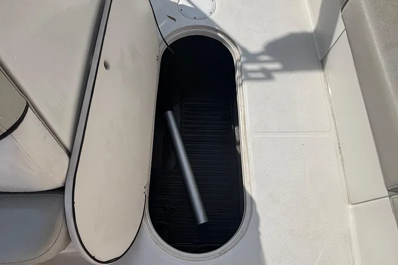 Slide: The Image of Open storage compartment on 2019 Starcraft MDX 191 O/B boat deck. - 22