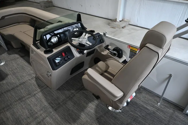 Slide: The Image of 2026 Bennington S Swingback 22 SSB boat interior with modern helm and seating. - 4